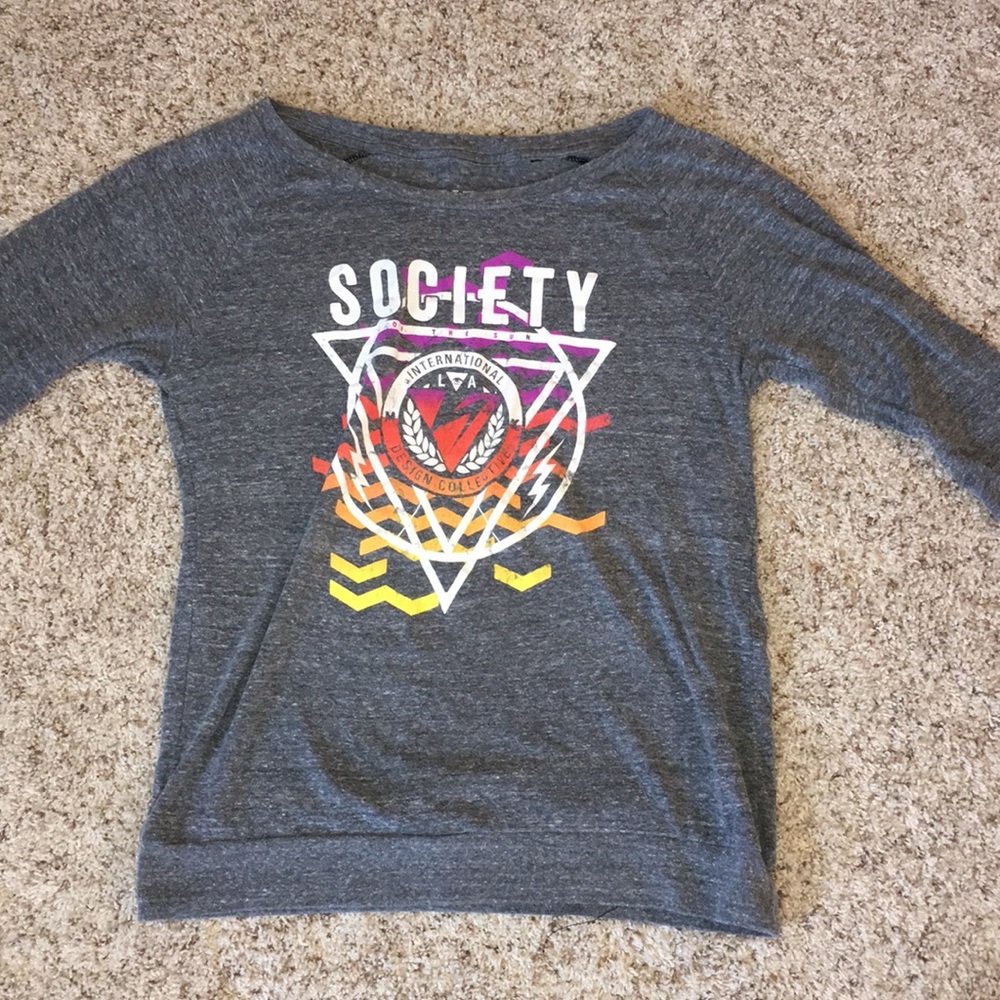 Society women’s size medium long sleeve shirt.